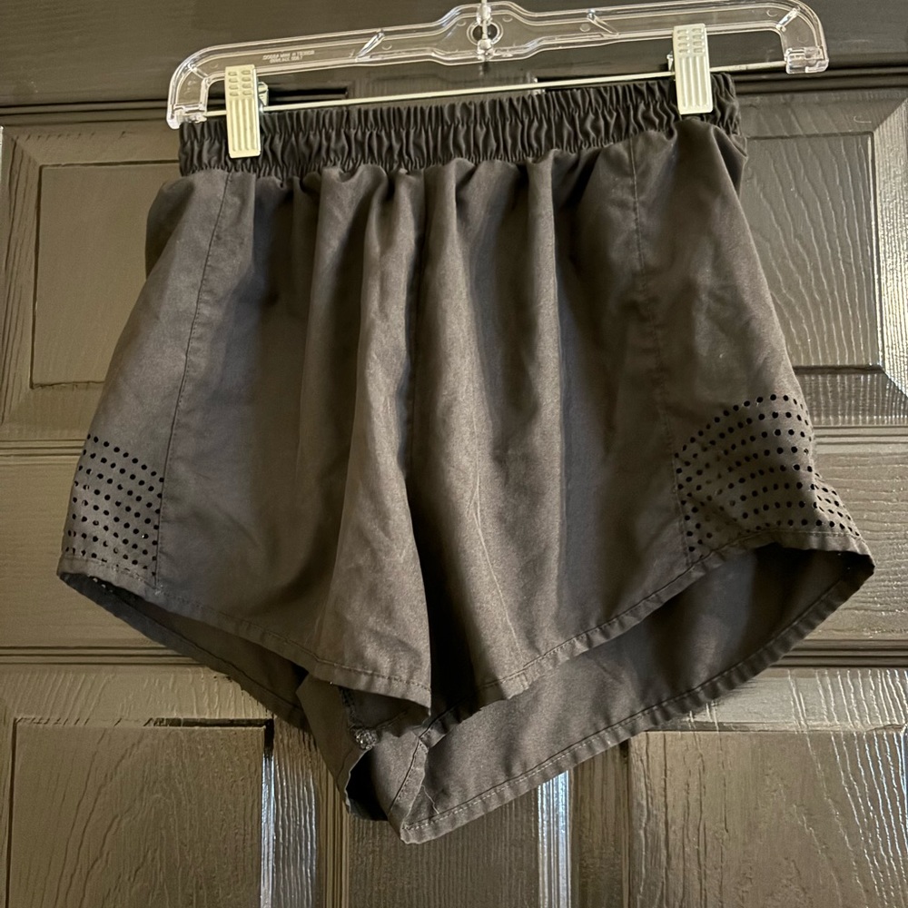 Black athletic shorts with cute design on side